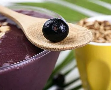 acai berry is small and purple